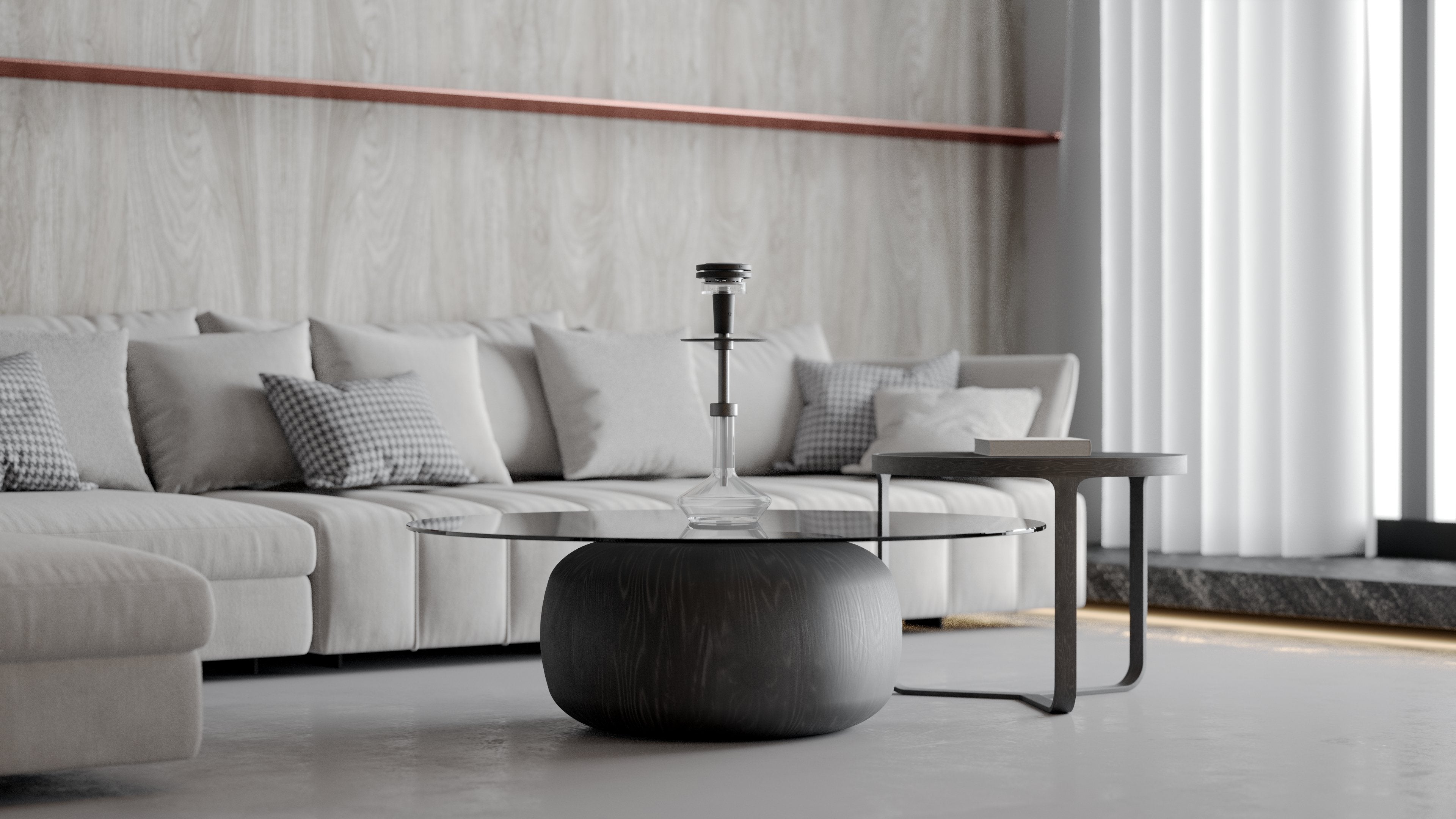 Quasar Raas 2 elegantly displayed on a modern glass coffee table in a living room setting
