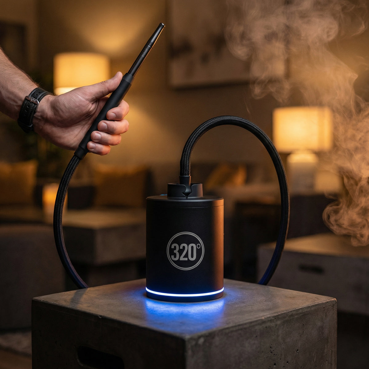 320° LED electric shisha starter pump in use during a hookah session with the LED ring glowing cool blue and a braided hose connected to the top cradle — the automatic draw pump that starts your hookah for you., image 3 of 12