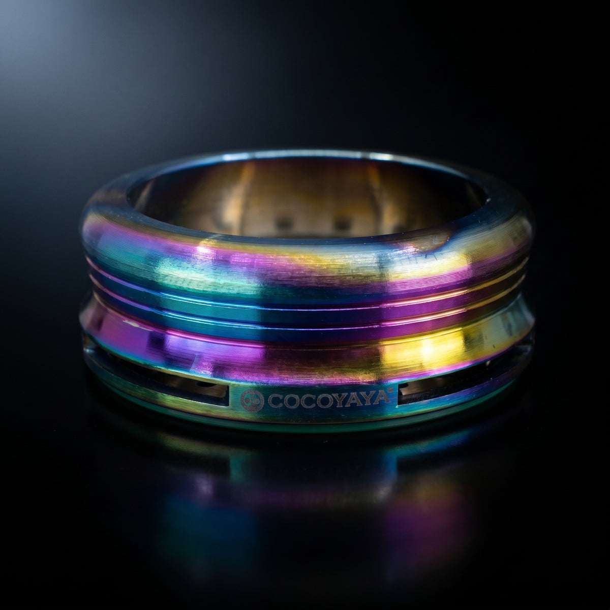 Cocoyaya Pro 5 Rainbow HMD macro detail showing iridescent banded finish and COCOYAYA logo, The Premium Way, image 4 of 5