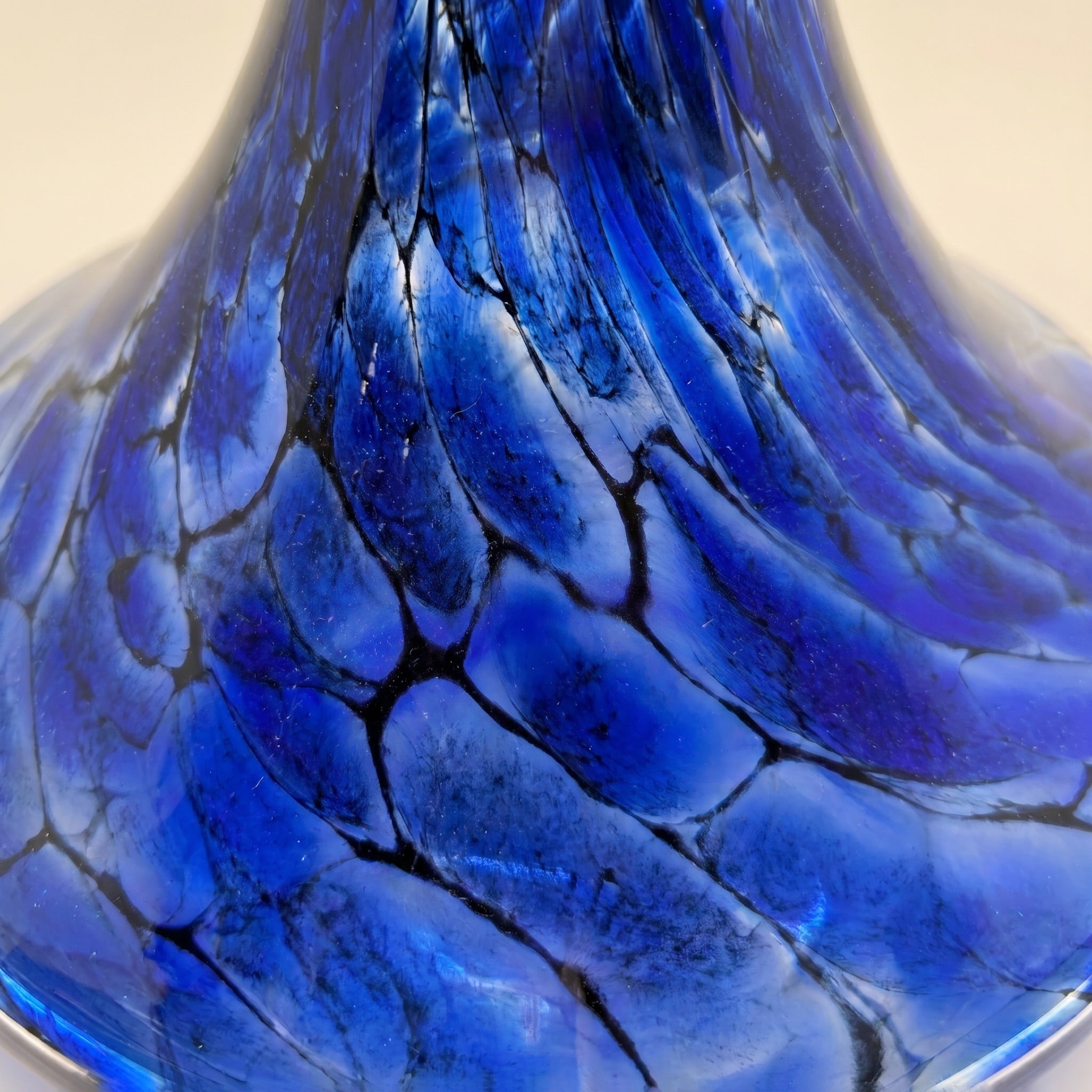Macro of Sapphire Web vase by Essentials, irregular black veined cells in deep cobalt hand-blown glass
