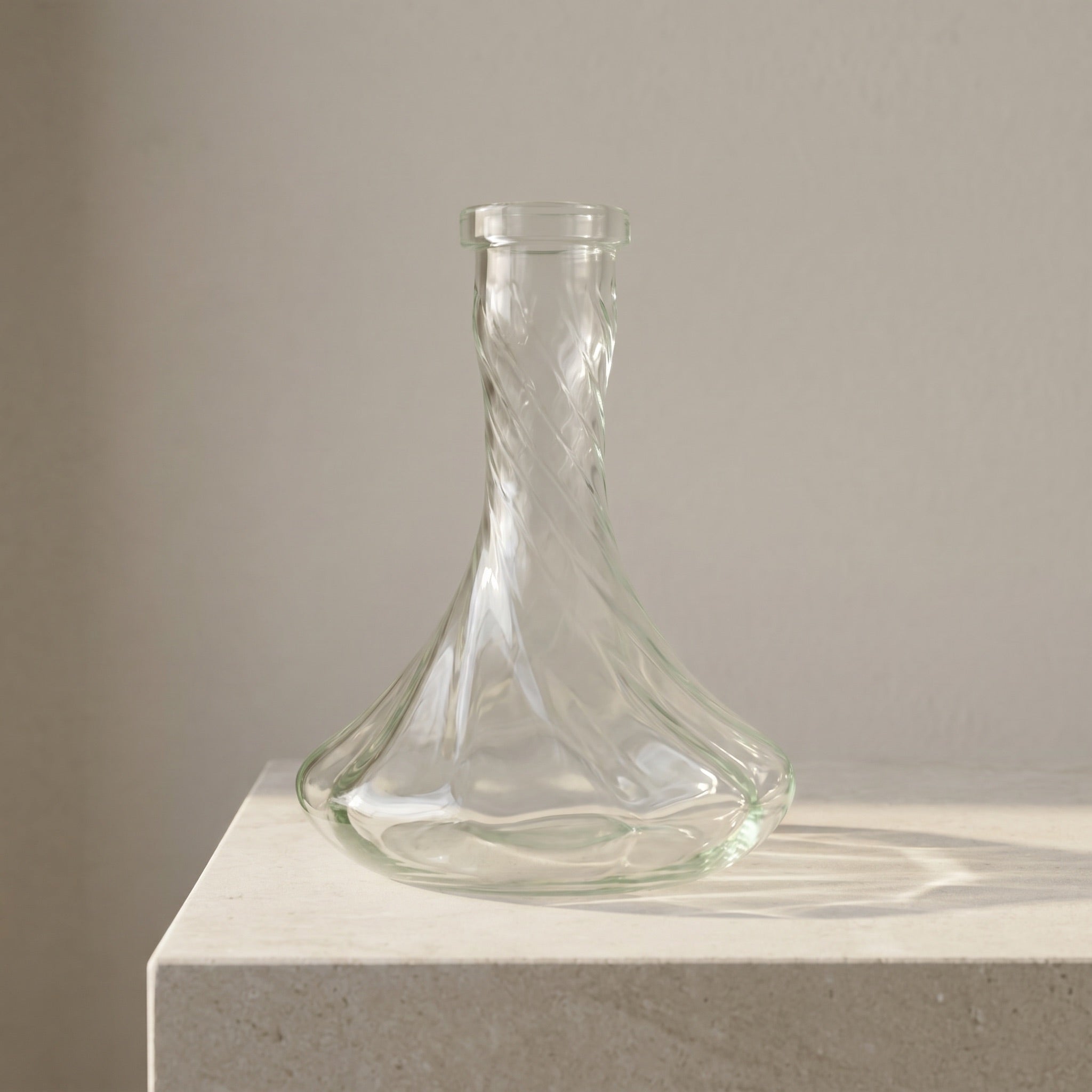Essentials Twist Clear Russian shisha vase on a pale stone surface, optic-moulded spiral glass with 45mm Russian fit