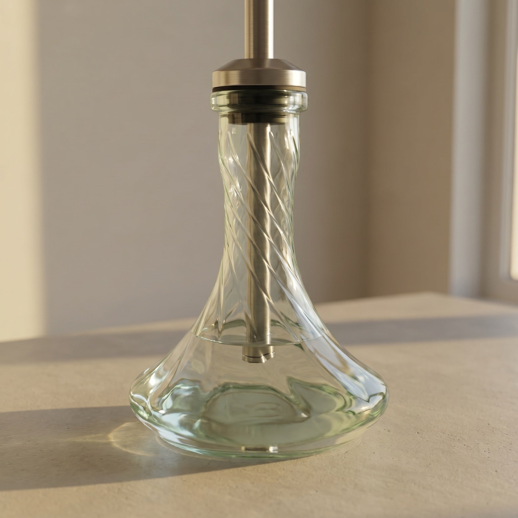 Essentials Twist Clear shisha vase paired on a brushed steel stem in golden hour daylight, spiral magnified through the glass body