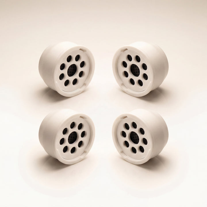 Kaloud Ayara Large replacement pods 4-pack on warm studio white, activated carbon flower-pattern filter faces — The Premium Way