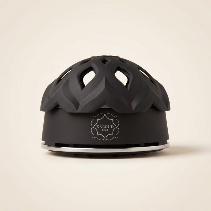 Kaloud Lotus I+3 Niris Black HMD with matte black base, polished silver rim, and lotus-petal vented lid
