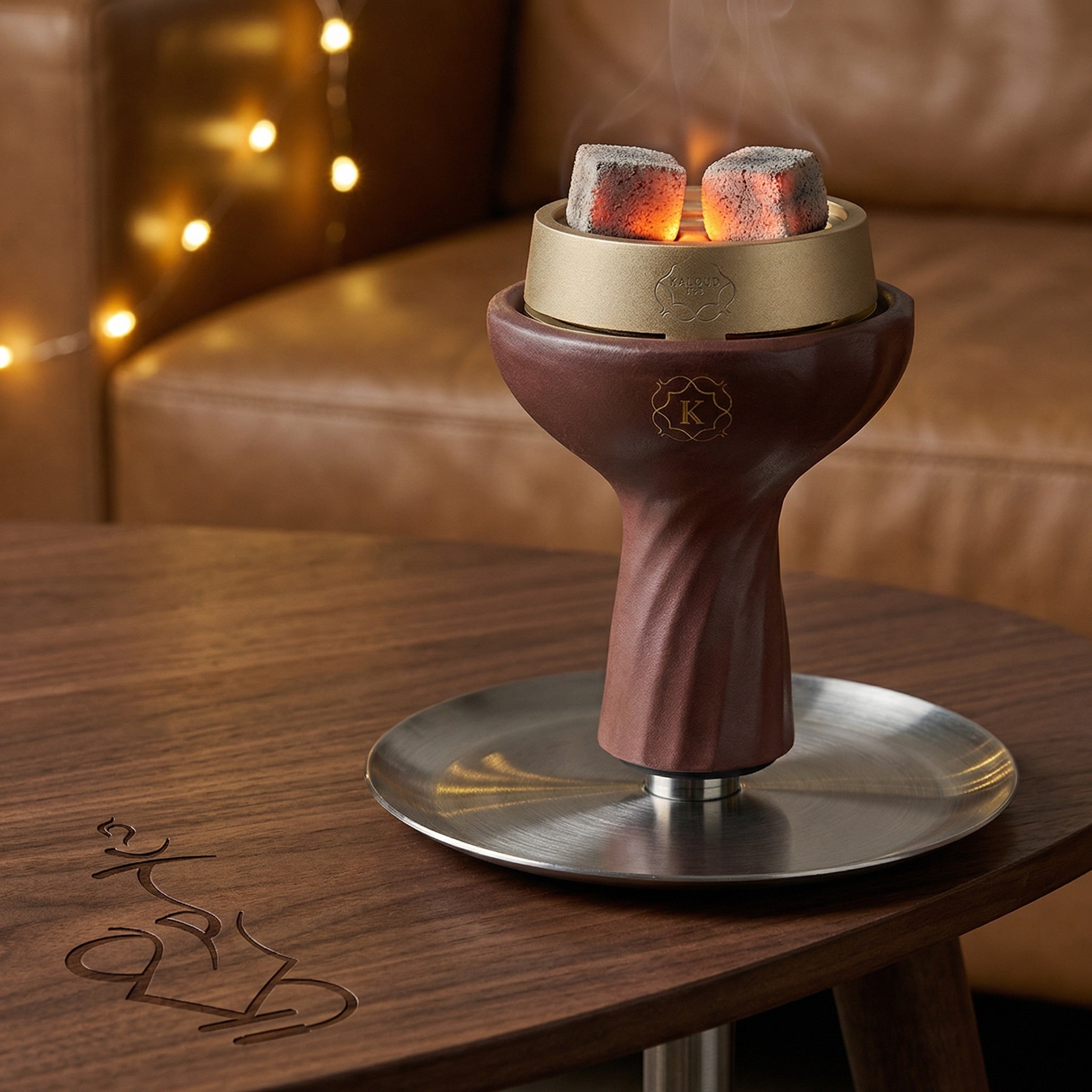 Kaloud Samsaris Kore Qì red clay phunnel bowl with Kaloud Lotus I+3 heat management device and glowing coals in a warm session setting