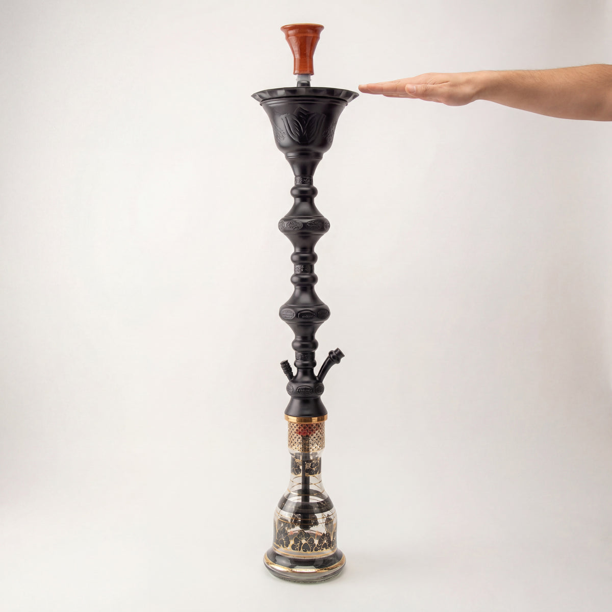 Khalil Mamoon Ice Shareef Black 90cm hookah with hand at bowl height showing flagship 90cm scale, image 6 of 16