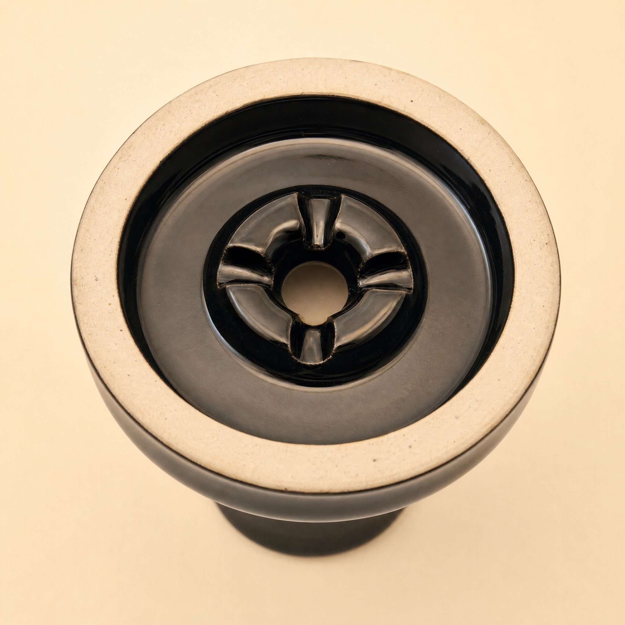 MIT Luxury Ashera Eclipse bowl macro top-down detail of glossy obsidian-black glaze around the phunnel spire