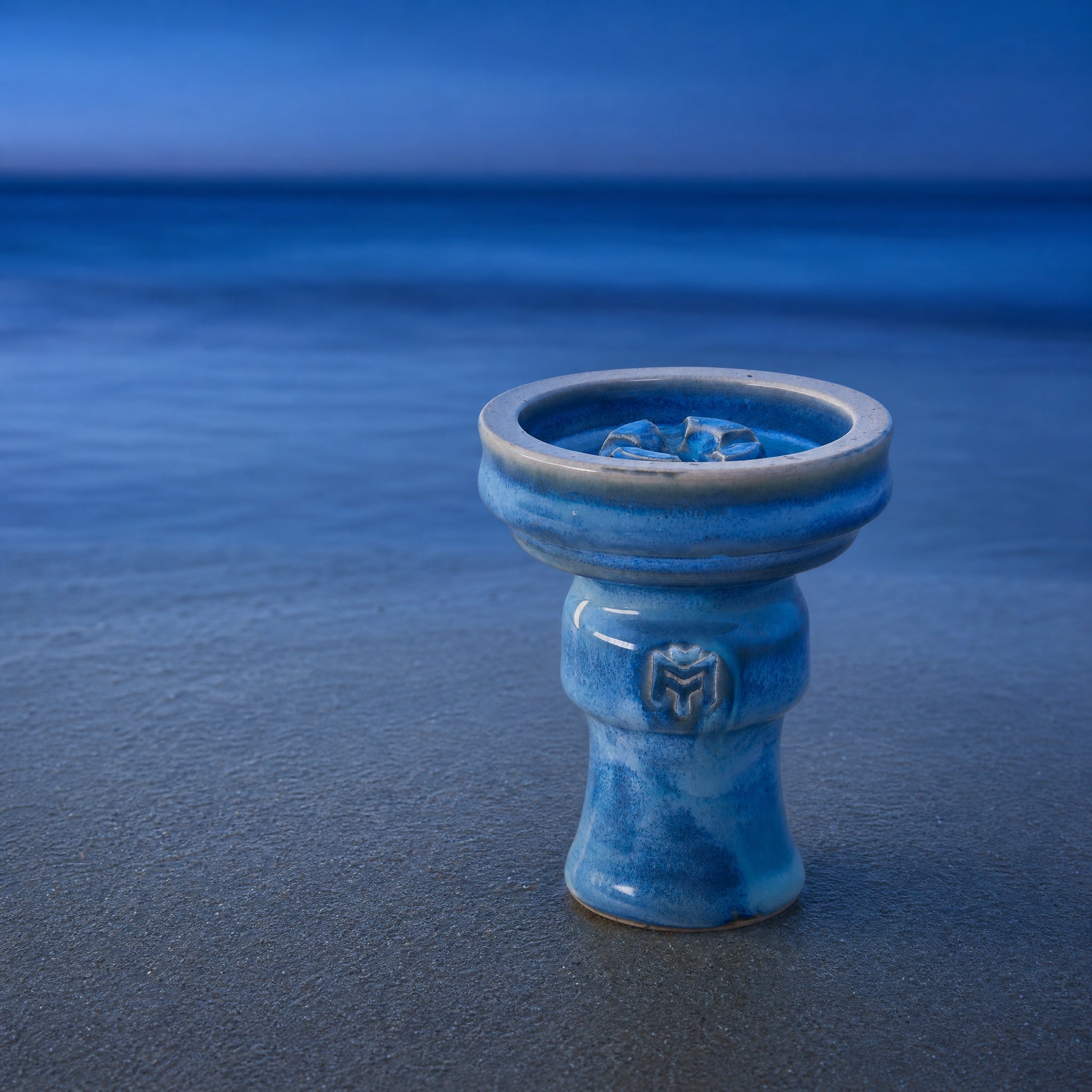MIT Luxury Ashera Tide bowl on wet sand at tide line, Mediterranean shoreline at blue hour