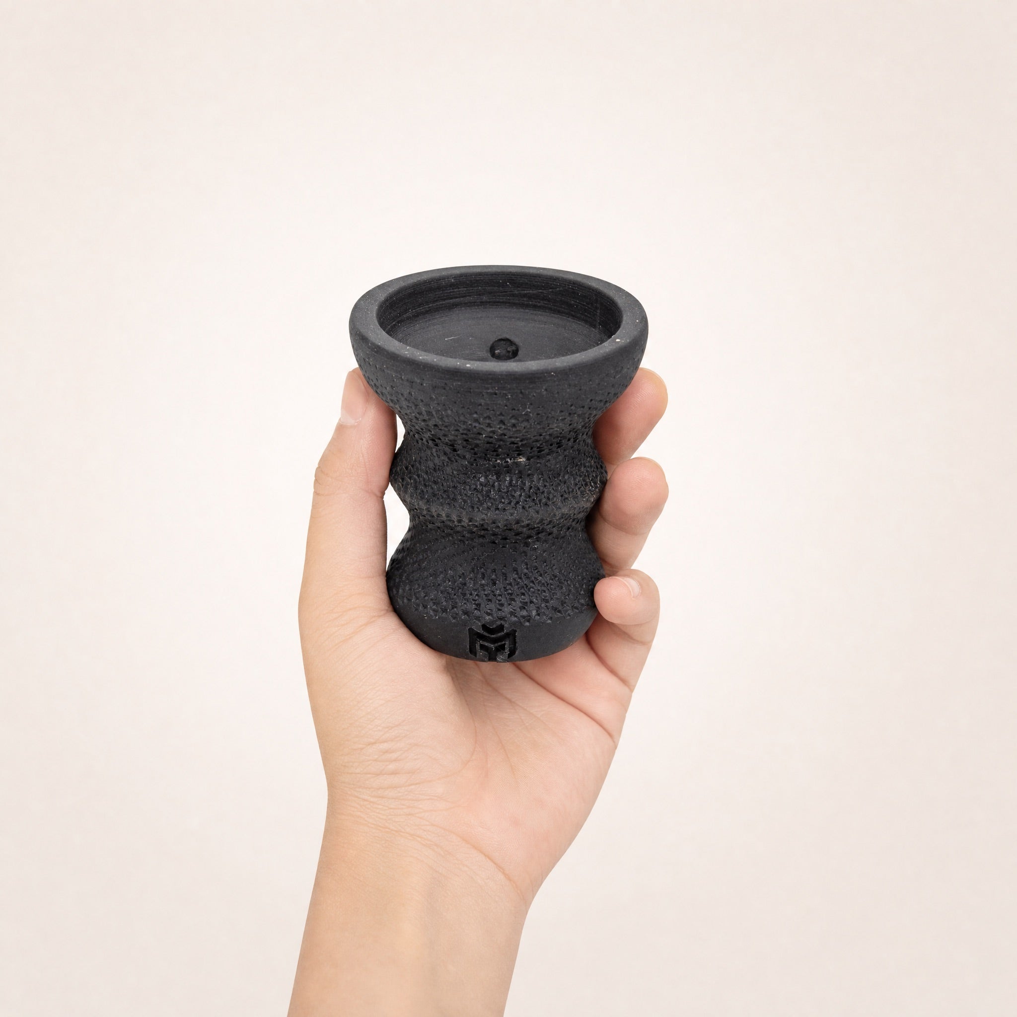 MIT Luxury DarkStar Turkish bowl held in hand for size reference, 87mm tall handmade stoneware