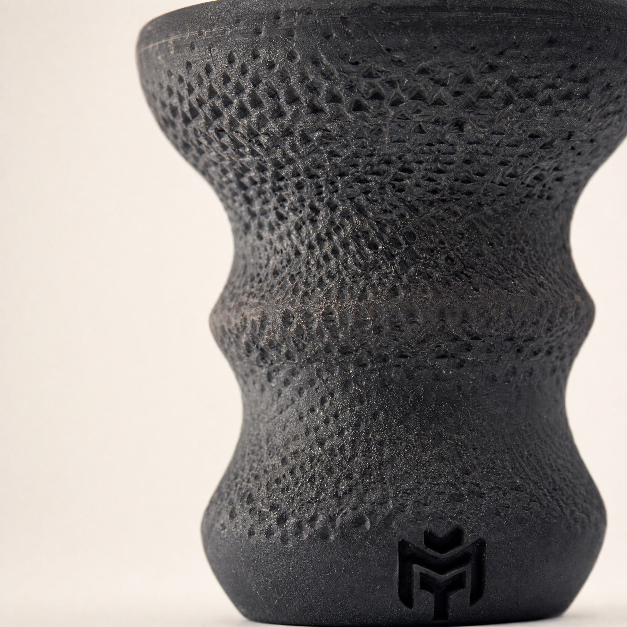 MIT Luxury DarkStar Turkish bowl close-up, stippled diamond-pattern unglazed stoneware texture from Turkey