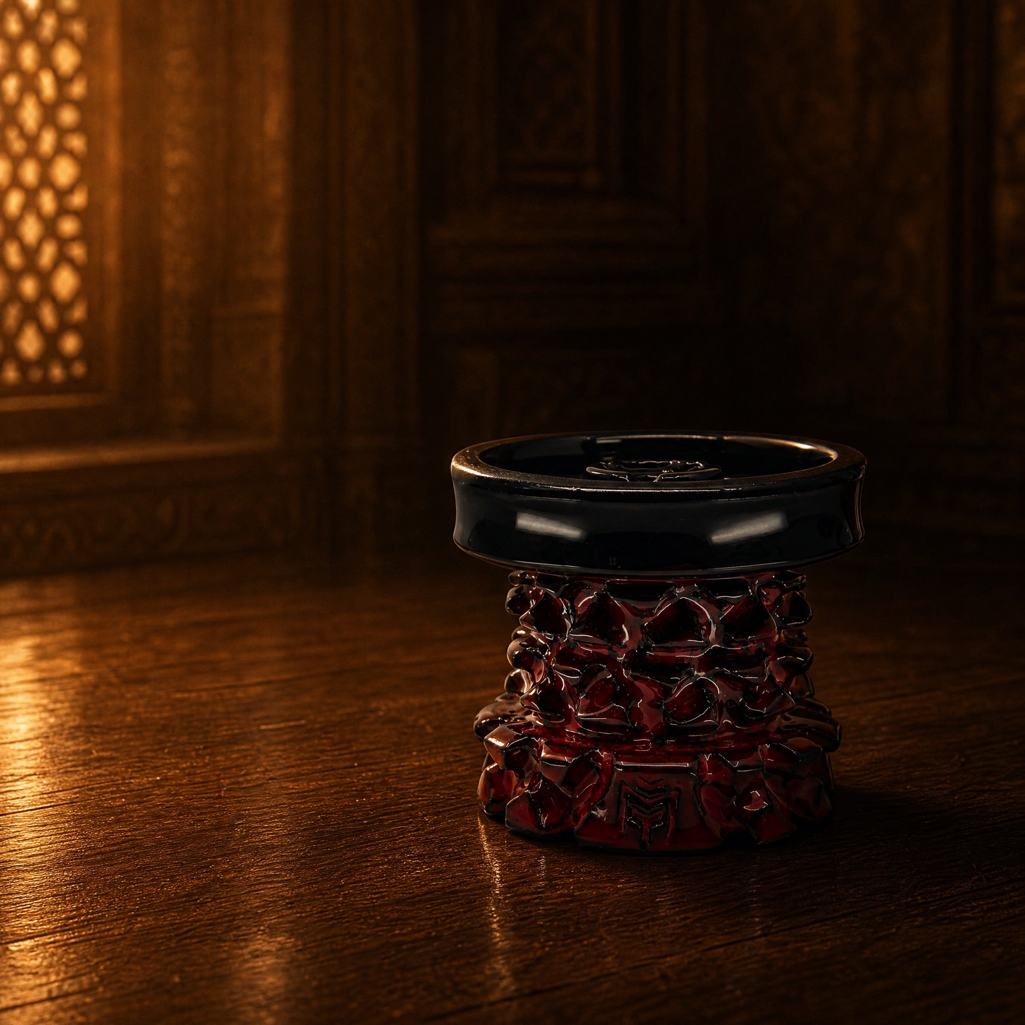MIT Luxury Mitovation V2 Ruby bowl on aged hardwood with jali screen light, Mughal palace antechamber at dusk