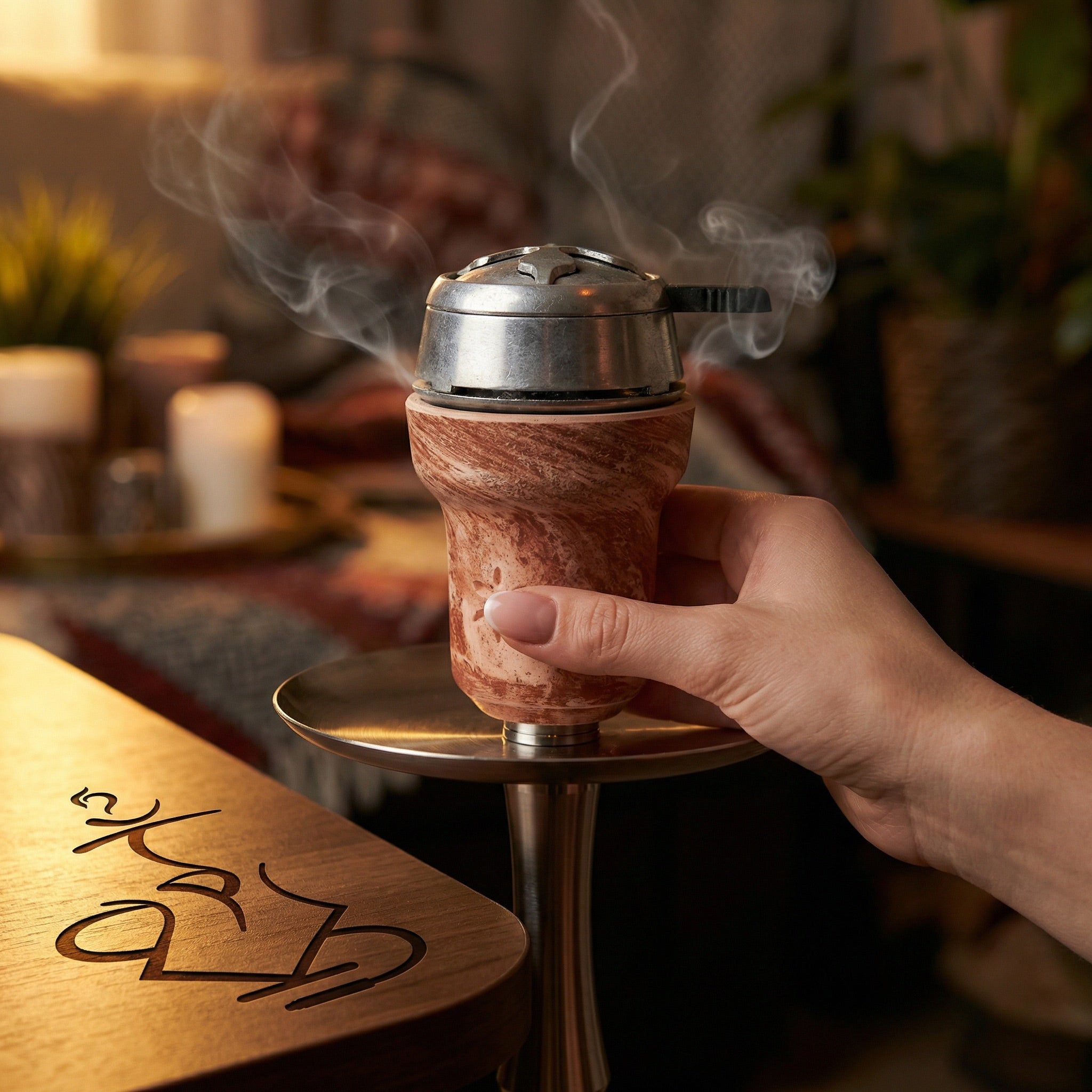 Solaris Titan clay hookah bowl in use on a hookah with heat management device, warm session setting with subtle smoke