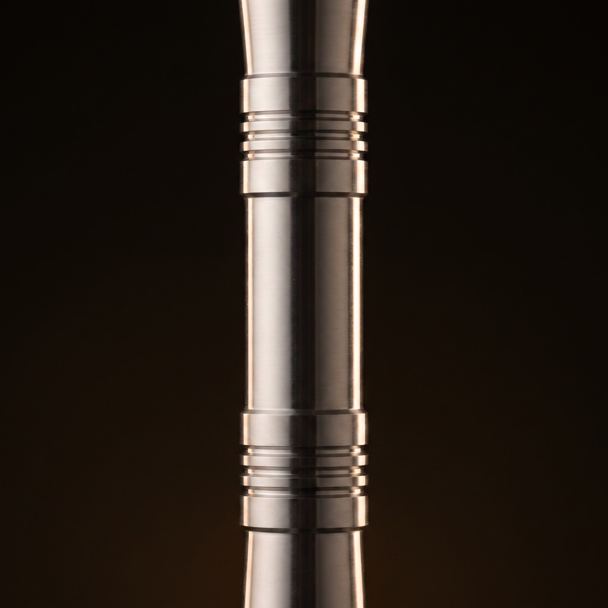 Steamulation Mini Gen II close-up of milled decorative rings on brushed satin V2A stainless stem, The Premium Way